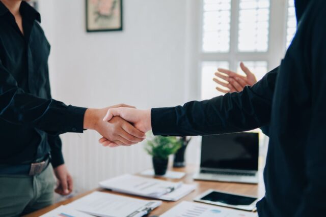 business people shaking hands