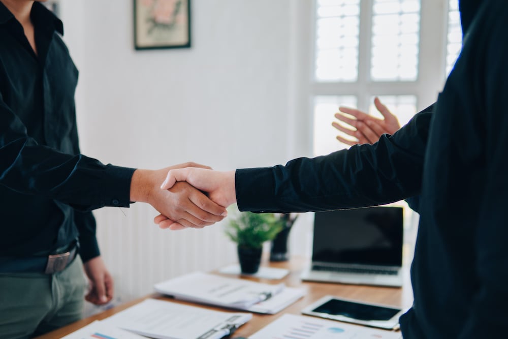 business people shaking hands