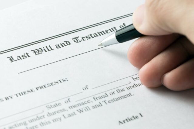 hand signing a will